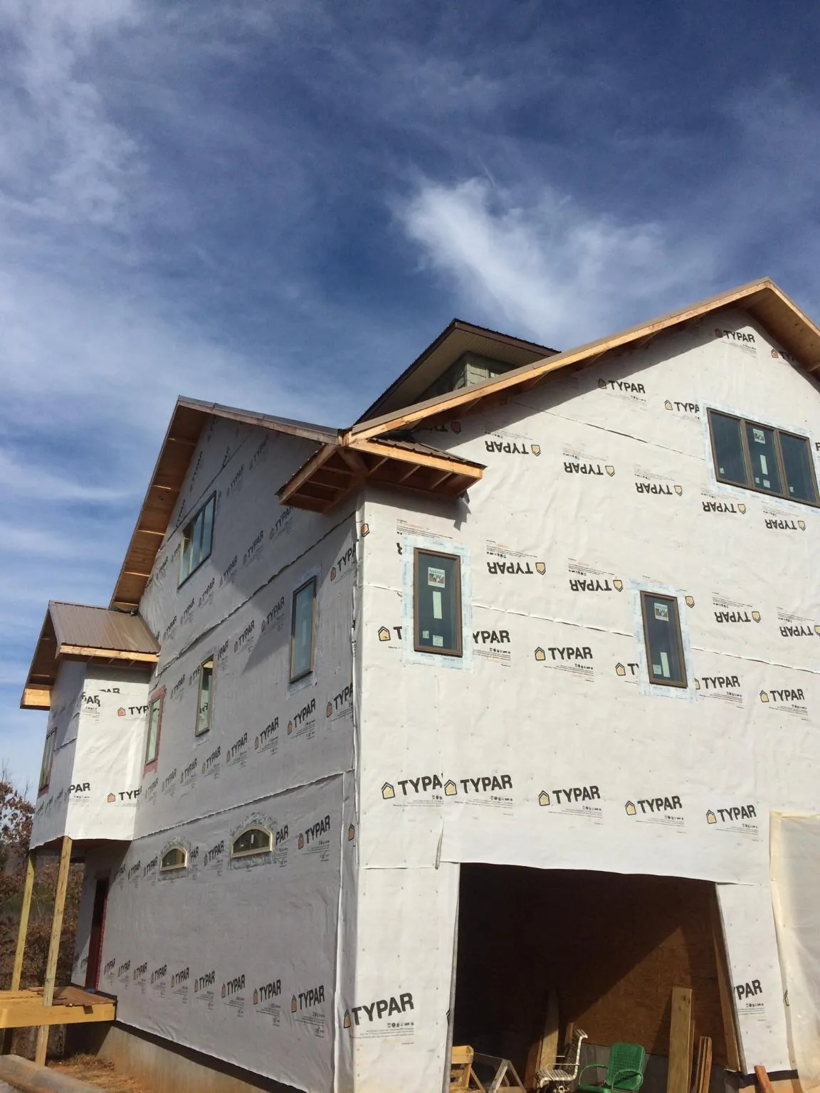 Stick built house wrapped in Typar with new roof framing and dormers in Boca Grande